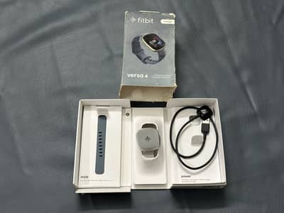 Box open and 2  days used only  google smart watch firbit bersa 4