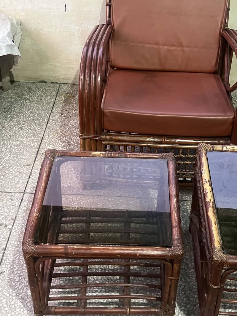 Cane sofas (3) + table (3) set 7