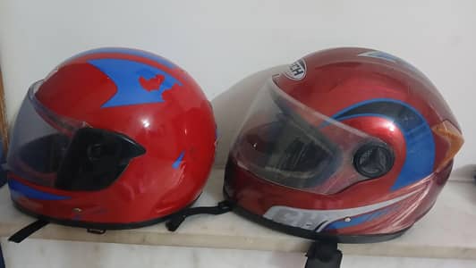 2 helmets for sale . . .