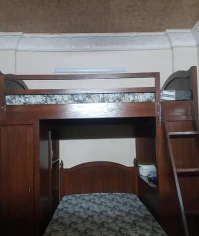 KIDS WOODEN BUNK BED USED FOR 9 MONTHS
