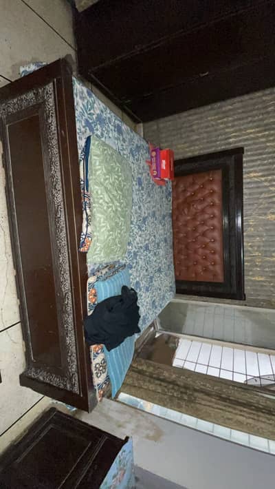 Wooden bed in good condition
