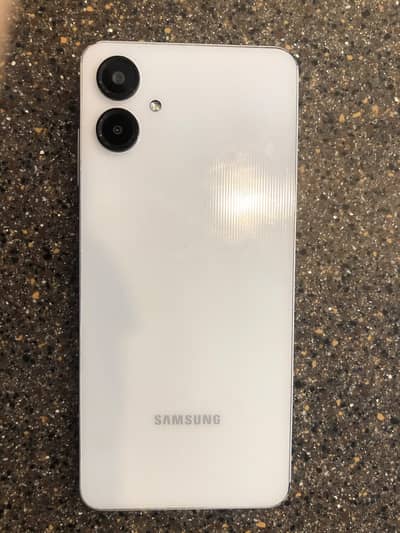 Samsung galaxy A06 with box and charger