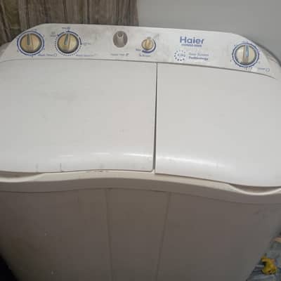 Haier washing machine 12 kg washing good condition washing plus dryer