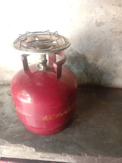 New condition gass slender with stove 4 kg urgent sale
