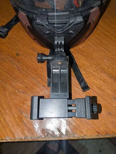 Helmet mount for mobile phone or go pro camera