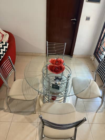 Modern glass top dining table