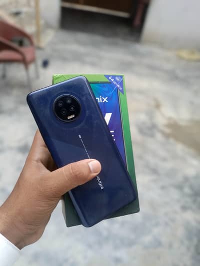 Infinix Note 7 gaming phone side finger