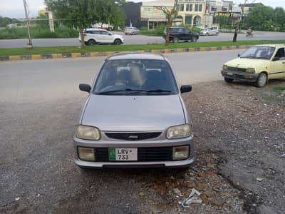 Daihatsu Cuore 2004 Shalimar Rose silver color