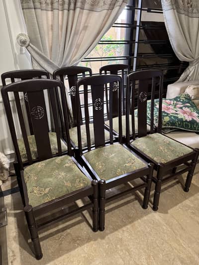 6 Dining chairs with green cushion covers
