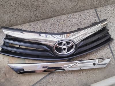 TOYOTA COROLLA GLI ORIGINAL FRONT GRILL AND REAR GARNISH
