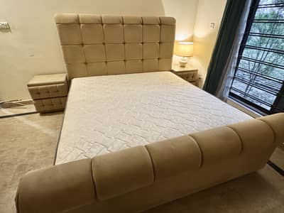 King size luxury upholstery bed with side tables with glass tops