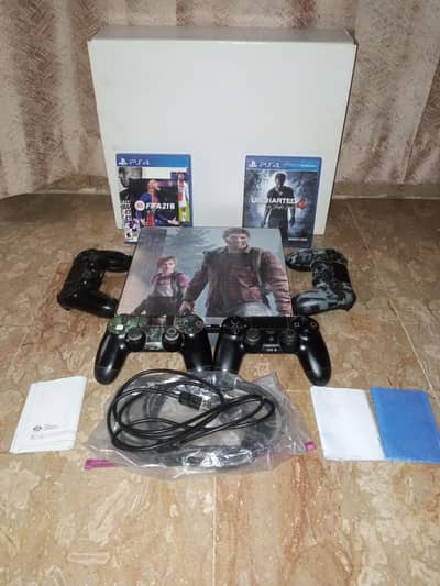 Ps4 Slim 1TB Sealed with 4 Controllers and 2 CDs