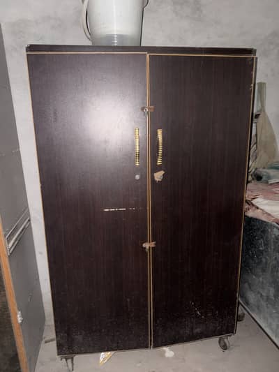 2 Door Wooden Cupboard / Wardrobe with Wheels – Good Condition