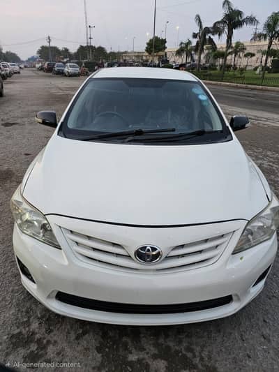 Toyota Corolla XLi 2012/Regsitered 2014, Excellent Condition White Clr