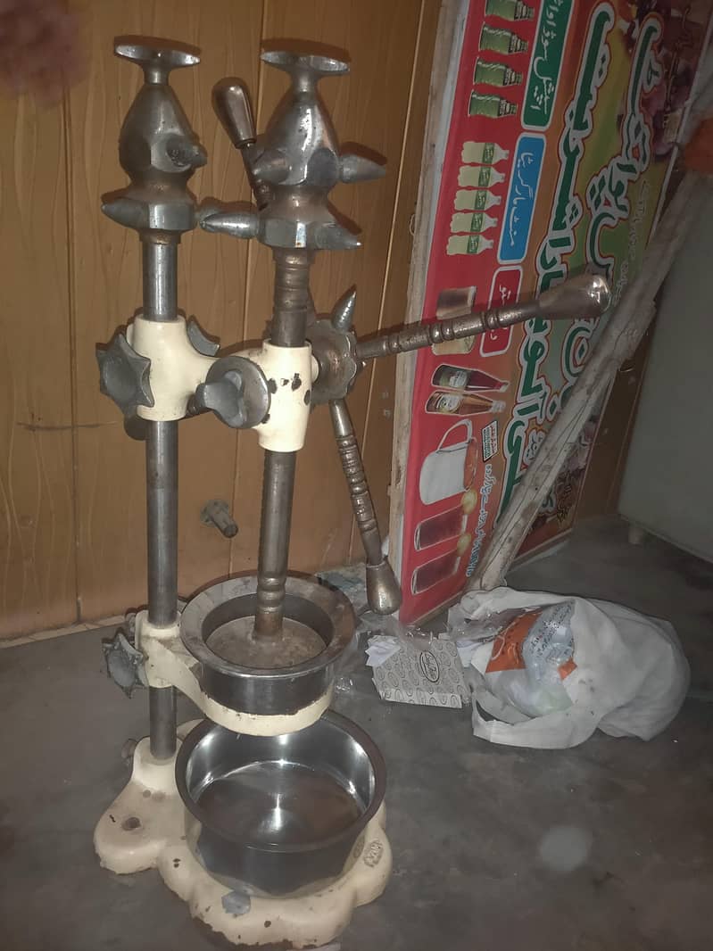 ہاتھ والی مسمی اور چکوترے والی جوس مشین چھ نمبر ہے 2
