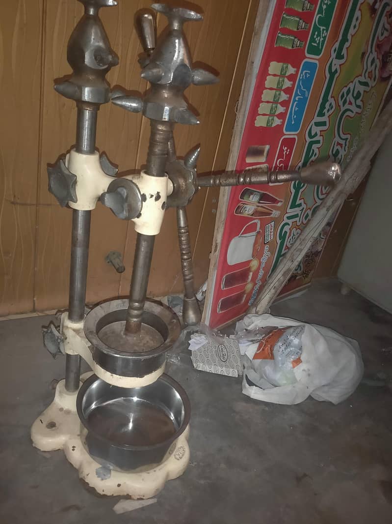 ہاتھ والی مسمی اور چکوترے والی جوس مشین چھ نمبر ہے 3