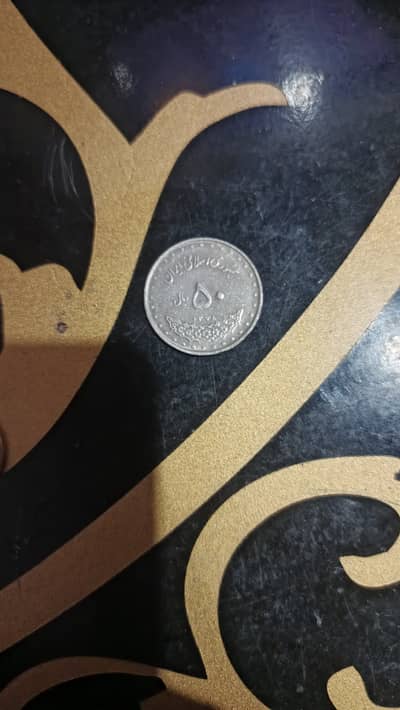 2 foreign coins for sale