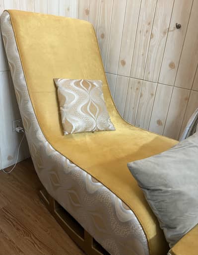 Yellow rocking sofa chair with a mini sofa chair