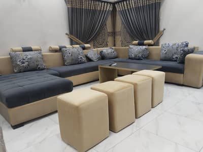 L-shaped sofa set with chaise , 4 ottomans and table