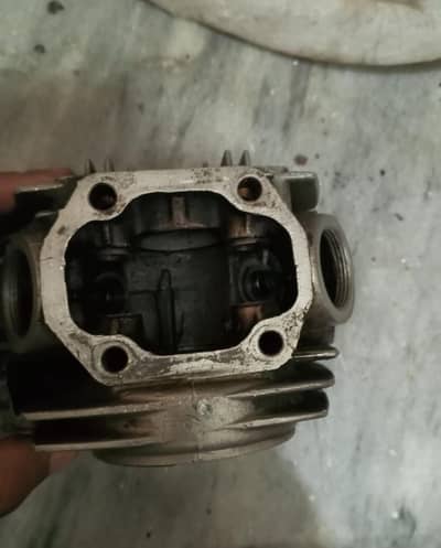 Head cylinder 78 contacting road back tyre