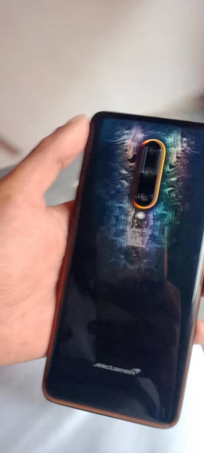 one Plus 7t pro I am stalling good candeshan ok phone 12 JB ram 256 JB