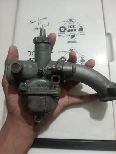 Honda 125 carburetor