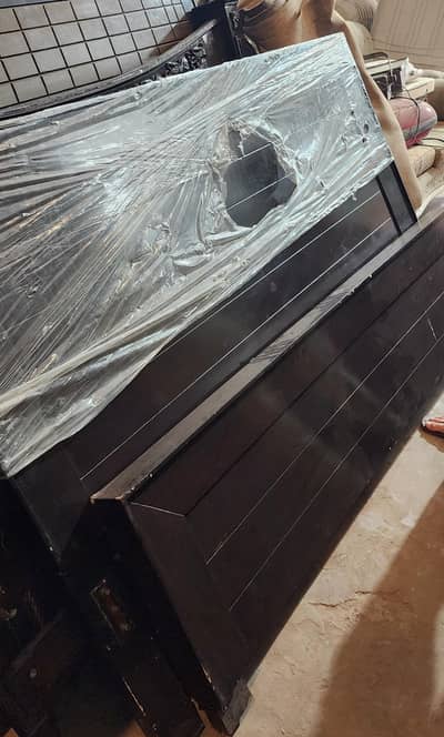 wooden double bed