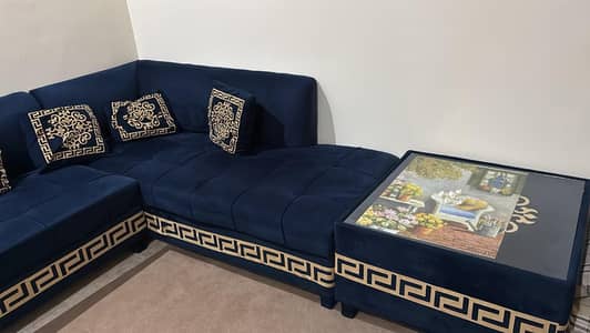L shaped sofa with table