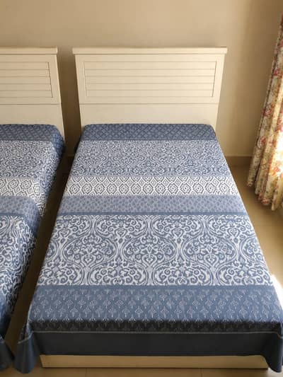 set of single beds,1 side table and 1 study table made with lasani woo