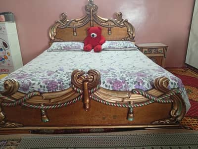 king size bed with side tables and dressing table