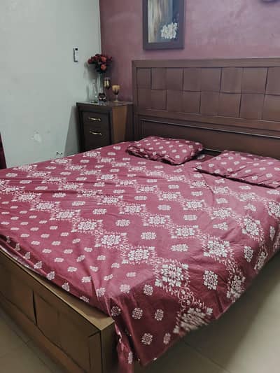 Wooden bed brown color