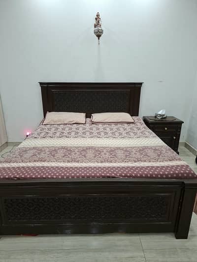 Wooden Queen Sized Bed
