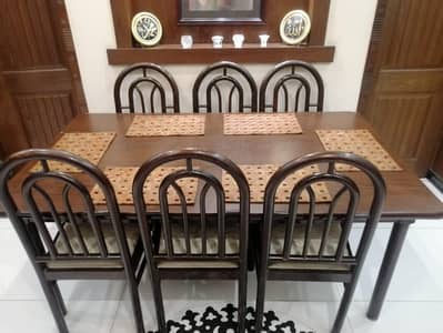 Wooden dining table with 6 chairs