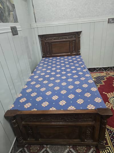 single bed with  side table
