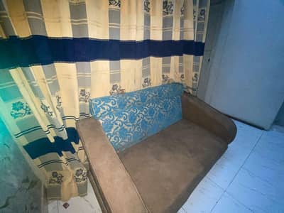 sofa 50/50 condition colour :copper and blue