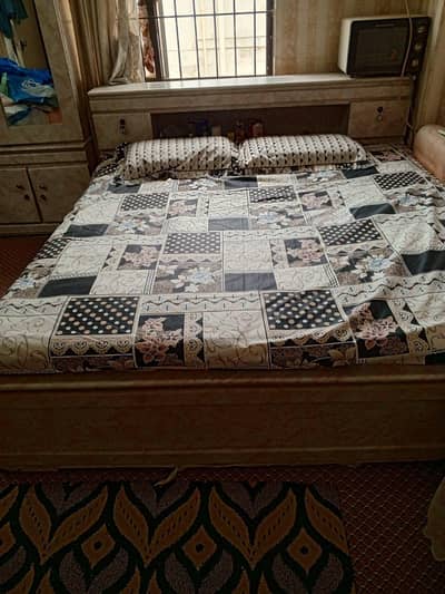 king size bed with matress, dressing table and cupboard
