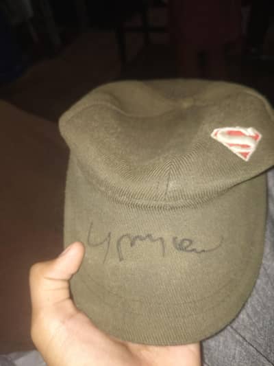 CAP WITH SIR YOUNS KHANS SIGN