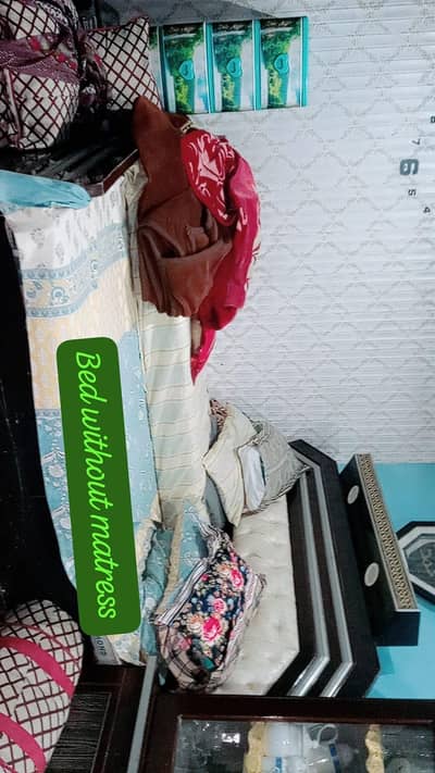 Bed (without matress),cupboard,dressing table,2ndshokas, and drawers d