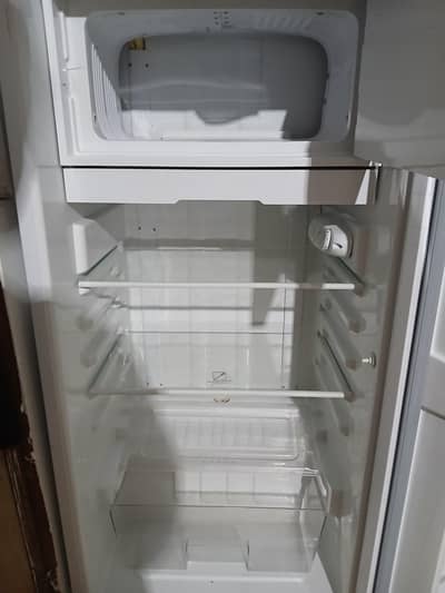 dawlance single door with ice box portio