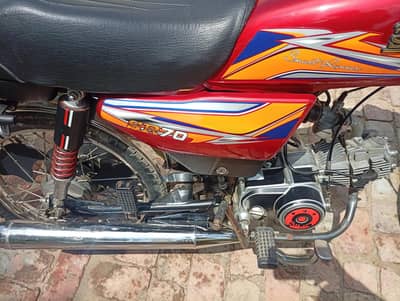 Hi Speed baik cd70 model 25 number laga hua hai Islamabad ka
