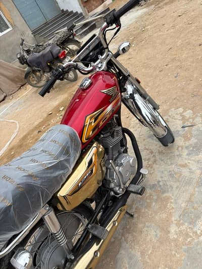 honda CG 125 gold red open letter
