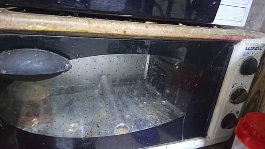Luxell mirco wave oven