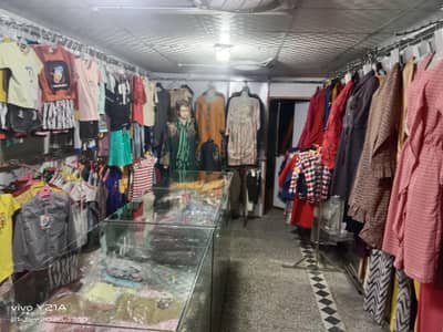 SHOP FOR SALE OF GERMENTS