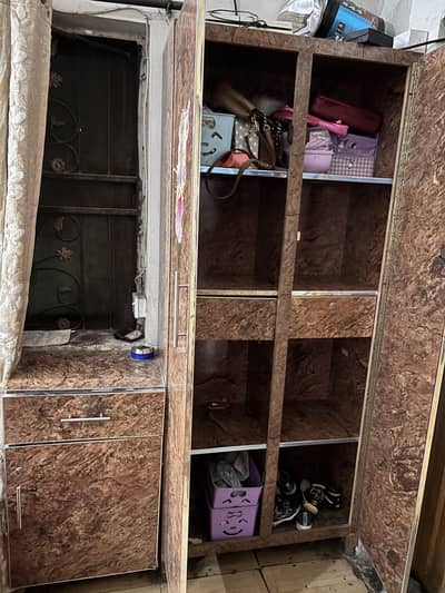 solid wood cupboard used for kids with side table