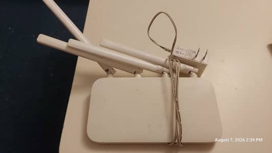 1 Xiaomi router R4AC and 2 PTCL tv devices
