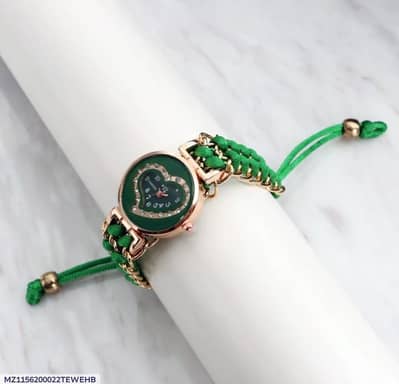green braided women's watch with rose golden heart dial