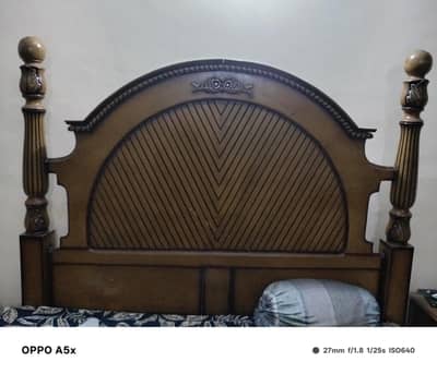 king size double bed with 2 side table and dressing.