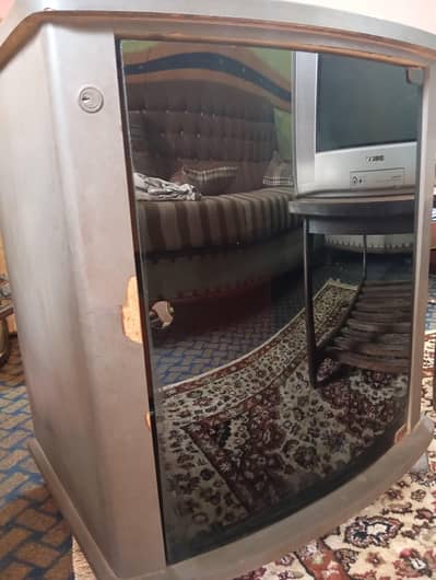 Tv Trolley-Single door Tempered Curved Glass, Sheet Made. 4000/=