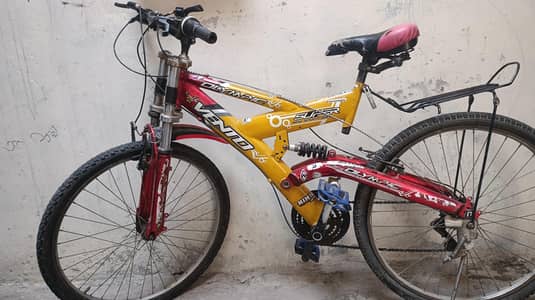 mountain bike with back suspension ( double gear)