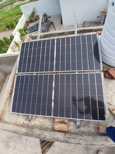 310 watts 2 solar pannel, stand , 20 gazz wire